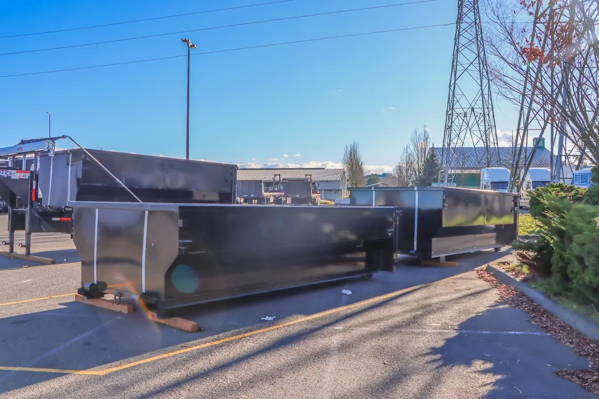 Roll-off dumpster ready for waste disposal at job site for 3 Yard Dumpster Rental in Concord